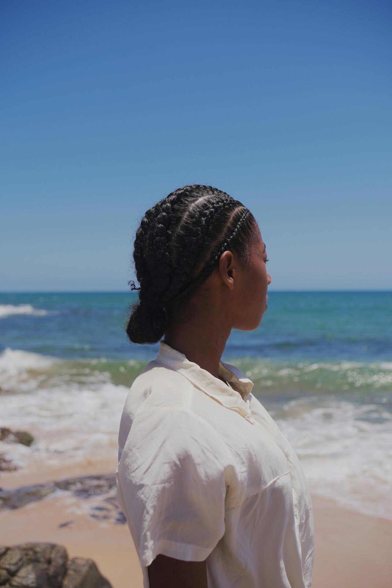 Woman looking out at ocean